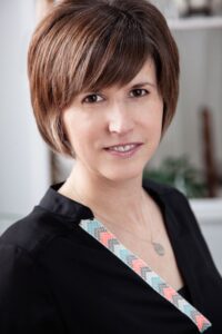 Photo of Nanette, founder of Potential Actually, introducing their purpose to help others awaken their power and discover transformative results.